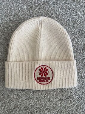 REVOLVE Cream Knit Beanie with Red Logo Patch